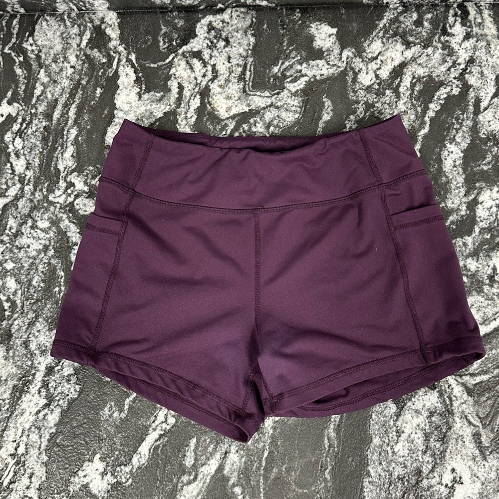 Born Primitive Mid Rise Workout Shorts w/ Pockets | Purple